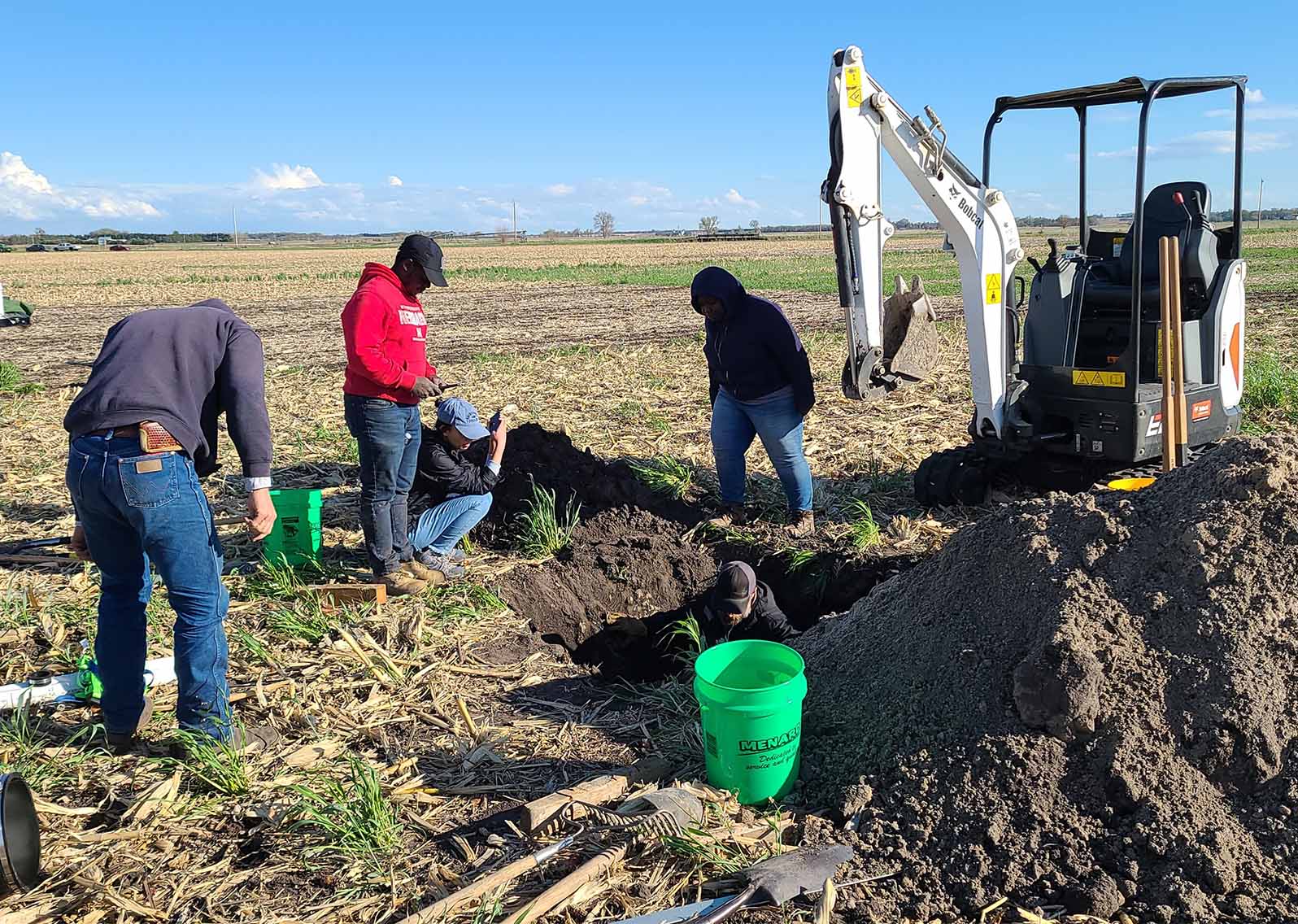 People working in field