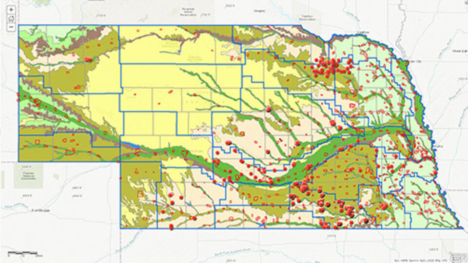 Map of Nebraska with red dots