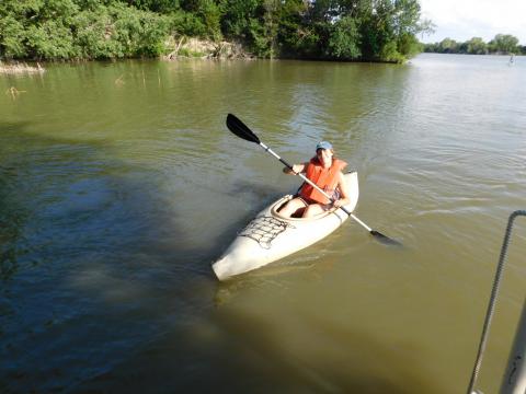 person in kayak on water